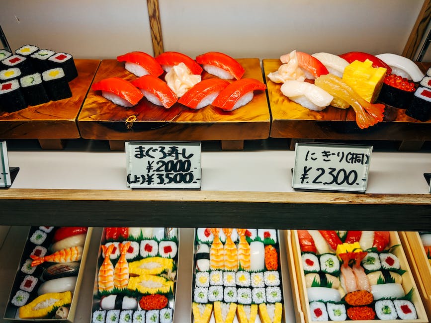 Image of sushi art with different types of sushi rolls and toppings displayed artistically